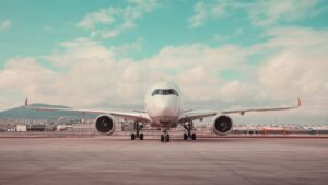 Commercial airplane on runway — WestJet process serving Calgary guide